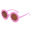 Süße rosa Kinder-Sonnenbrille in Gänseblümchen-Form mit dunklen getönten Gläsern - Lila