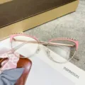 Fashionable pink and gold cat-eye frames with anti-blue light lenses for women's style. - Gold Pink / Photochromic Lenses