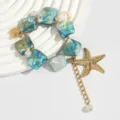 Detailansicht der Meeres-Halskette mit Muscheln, Seestern und Perlenverzierung. - Armband (1052460) / Blau