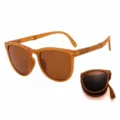 Portable folding sunglasses with UV protection in stylish amber frames - Autumn Tea