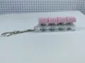 Portachiavi antistress con quattro interruttori meccanici e tasti rosa coordinati - Stile a Quattro Tasti con Copertura Spessa / Con Luce / Rosa