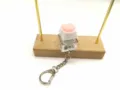 Close-up of pink soft silicone corgi butt keycap on a mechanical switch keychain - Pink Corgi Butt / Normal Chain Without Light