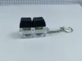 Close-up view of a dual mechanical switch fidget toy keychain with black keycaps - No Light / [2-Key Thick Cover Ordinary Chain] Black