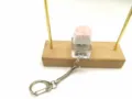 Detail view of a cute Corgi butt silicone mechanical switch stress relief keychain - Pink Corgi Butt / Snake Chain Without Light