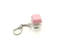 Detail shot of a pink keycap mechanical switch keychain for sensory stress relief - [with light] dark pink