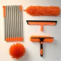 Versatile 4-in-1 window and solar panel cleaning kit with spliced stainless steel poles - 【orange box set】10-section pole + glass brush head + spider web head + fiber head + squeegee
