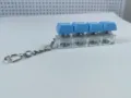 Detailed view of the 4-key mechanical keyboard switch fidget keychain with blue caps. - Four-Key Thick Cover Ordinary Chain / No Light / Blue