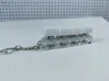 Detailed view of the 4-key mechanical keyboard switch keychain with glowing LED feature. - Four-Key Thick Cover Ordinary Chain / No Light / White