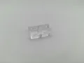 Close-up macro view of a transparent dual-slot mechanical keyboard switch tester base frame - Double Key Base / High Transparency