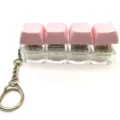 Cute mechanical keyboard switch keychain with pink keycaps, stress relief fidget toy for daily use. - 4-Key Luminous / Pink