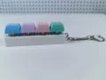 Side view of a 4-key mechanical keyboard switch tester keychain fidget toy in pastel colors - Style 13 / 4 Keys Without Light