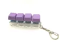 Mechanical keyboard switch fidget keychain with purple keycaps and light up design. - 4-Key Luminous / Deep purple