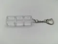Close-up of clear 3-compartment mechanical switch tester base with durable keychain ring - Triple Key Base With Regular Chain / High Transparency