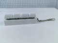 Detailed side view of a white 4-key mechanical keyboard switch fidget toy with keychain - White Style (Model 21) / 4 Keys Without Light