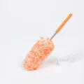 Extendable microfiber feather duster with bright orange handle for home daily cleaning. - Orange and White