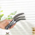 Grey three-finger blinds cleaning brush, ideal for air conditioner vents and window shutters. - Single Blind Brush - Bagged / Gray