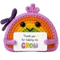 Handmade crochet rainbow plush toy with purple bow and appreciation card, cute decor. - GROW Rainbow Doll