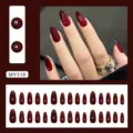 Gedetailleerd overzicht van 30 wijnrode kattenoog amandelvormige nepnagels set - Medium Amandelvorm / 30 stuks met lijm / Wijnrood Robijn Kattenoog