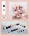 Detail of cute cartoon press-on nails set in navy blue and grey, 24 pieces pack - Cartoon Character (R008) / 24Pcs Set (Glue Style)
