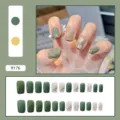 Close-up detail of green marble and daisy pattern press-on nails set with 24 pieces - R176 Spring Vibe / Glue Type