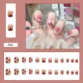 Umfassendes Set mit 24 Kunstnägeln mit süßen Schleifen-, Pfirsich- und Herzdesigns in Rosa. - Schmetterling Pfirsich Stil (Z062) / Kleber Version