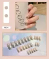 Detailed set of 24 silver glitter press-on nails featuring stylish white flame line art - Glitter Flame Style (R034) / 24Pcs Set (Glue Included)