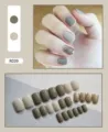 Set of 24 pieces grey-green and cream press-on nails with glitter accents shown on hand - Gray-Green Jump Color Style (R039) / 24Pcs Set (Glue Included)