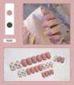 Close-up detail of 24pcs matte pink press-on nails with cute peach fruit patterns - Matte Peach Style (R040) / 24Pcs Set (Glue Included)