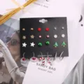 Detail of Christmas earring set with festive trees, candy canes, stars on display card - Mixed Christmas Charm Stud and Drop Earrings Set (TZ0445)