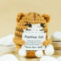 Handcrafted crochet positive cat doll with motivational message card, cute knitted toy. - Khaki Cat