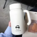 Taza térmica blanca de gran capacidad botella de agua de acero inoxidable con asa práctica - Vaso individual 1000 ml / Vaso blanco con revestimiento cerámico y asa, sin infusor de té