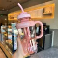 Large capacity pink plastic water bottle with straw and handle for sports and daily outdoor use. - 1300ml / Lucky Belly / Pink