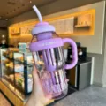 Large capacity sport water bottle with straw and handle, cute purple plastic tumbler cup. - 1300ml / Lucky Belly / Purple
