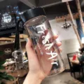 Transparante waterfles met 'Fresh Air' print en zwart draagkoord. - 600ml / Transparant Zwart