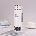 Λευκό ισοθερμικό μπουκάλι από ανοξείδωτο χάλυβα 316 με ιμάντα μεταφοράς και σχέδιο - 600ml / Λευκό