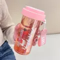 Portable plastic water bottle with straw and tea filter, pink design for women and students. - Pink