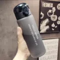 Portable frosted sports water bottle with flip top lid, large capacity gym drinking cup. - Frosted Black 780ml