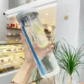Borraccia trasparente portatile in plastica con infusore per tè e paglia per l'uso estivo quotidiano. - 1ª generazione tazza con infusore grigia, 700 ml