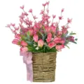 Close-up of pink artificial tulips in a rustic woven flower basket with checkered ribbon - 40CM / Pink
