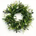 Detailed view of artificial olive wreath with white bellflowers for front door decor - Olive Bellflower