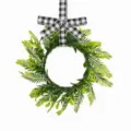 Artificial green fern leaf wreath with black and white buffalo plaid bow for door decor - Black and White Plaid Bow Style