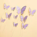 Detail of purple butterfly cake toppers with gold foil edges for birthday party decoration. - H02-purple