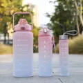 Gradient pink water bottle set large capacity frosted motivational sports cup with time marker - Three-Piece Set / Pink