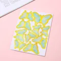 Light blue butterfly cake decoration inserts with gold foil edges on a pink background - Butterfly Topper Style (H04) / Blue