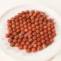 Perle tonde in pietra del sole rossa senza foro per creazione di gioielli fai-da-te - 8mm / Pietra del Sole Sintetica