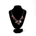 Festive Christmas charm necklace featuring snowflake, tree, and reindeer enamel pendants. - Christmas Necklace