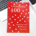 A4 dotted notebook detail view featuring vibrant red cover and clear ruled page text. - Red Polka Dot Thin Notebook
