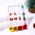 Close-up of festive Christmas earring set with enamel trees, bells and pearls on card - Bell Style (11#)