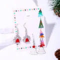 Close-up detail of festive Christmas enamel earring set featuring white trees and red bells. - Snow Tree Style (18#)