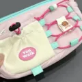 Pink multi-functional cute pencil case with cookie badge and elastic cord design - Pink